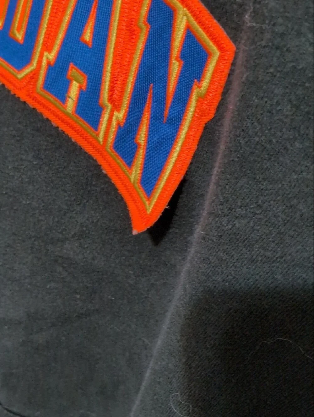 Jordan Black Hooded Sweatshirt with Orange and Blue Logo